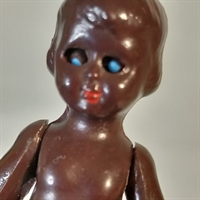 brun gammel dukke lille negerdukke retro legetøj genbrug
